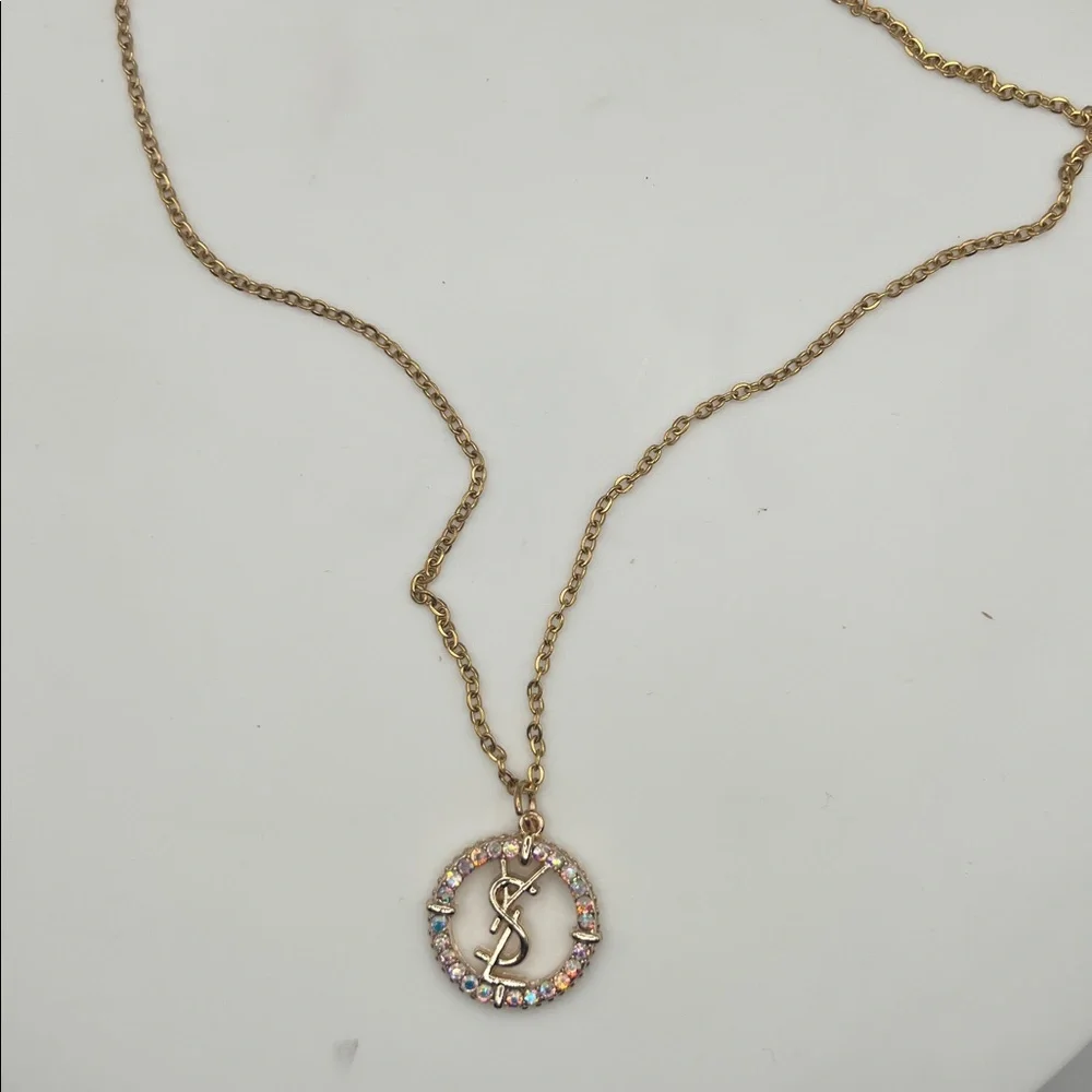 868. Elegant Gold YSL Pendant on 18” gold plated chain. - Picture 8 of 8